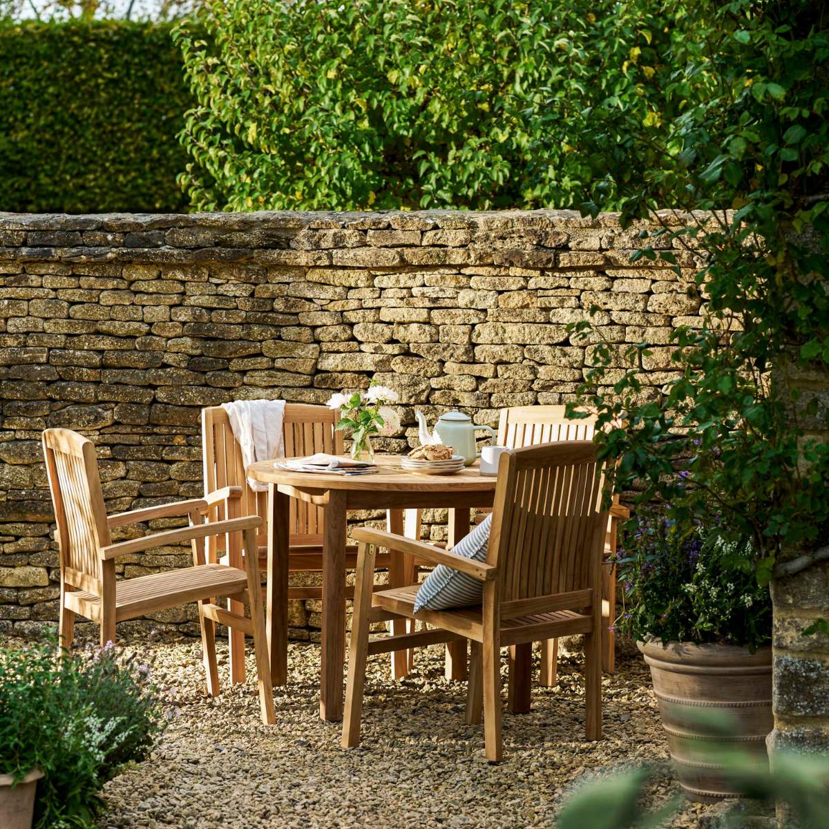 Garden Trading Churn Teak Round Table 100cm & 4 Henley Stacking Armchairs - Image 10