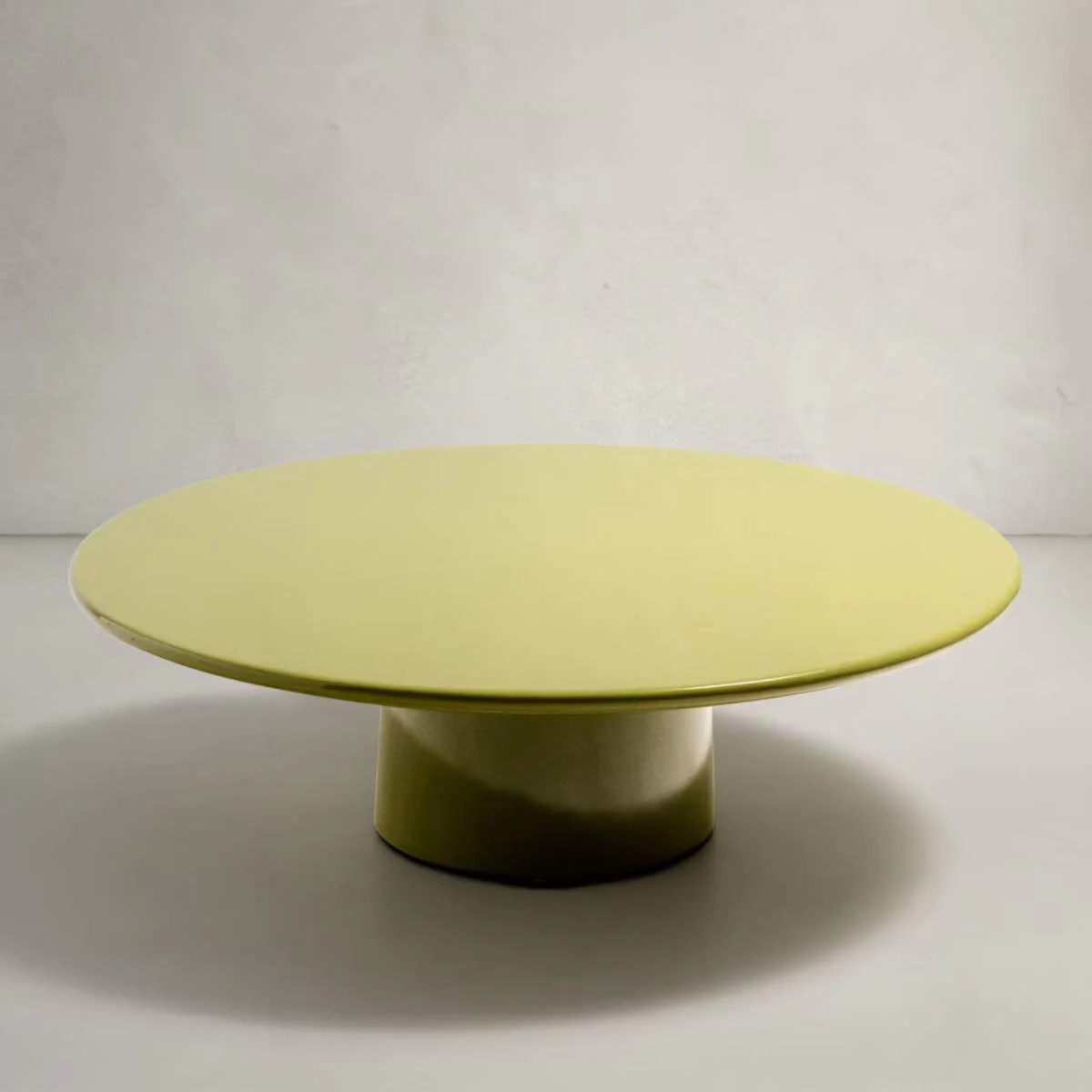 Kave Home Albanella coffee table in cement with glossy green finish Ø110cm