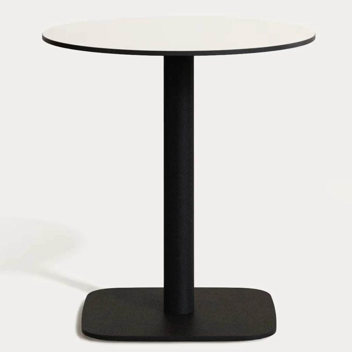 Kave Home Dina round outdoor table in white with metal legal in a painted black finish, Ø 68x70 cm